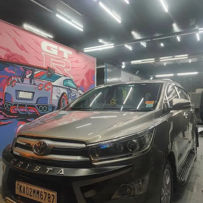 Red Jeep inside SDM Car Care workshop